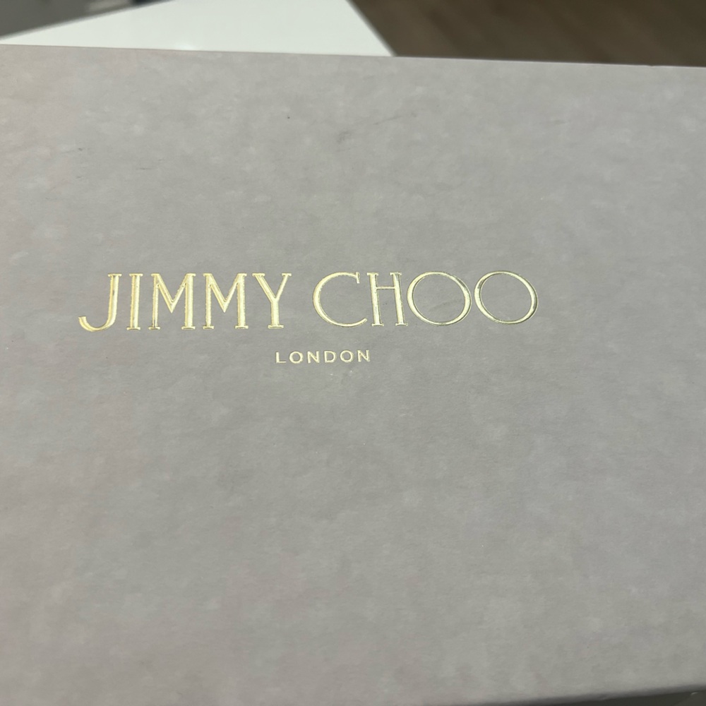 Brand new Jimmy Choo candle slides, only been tried on.
